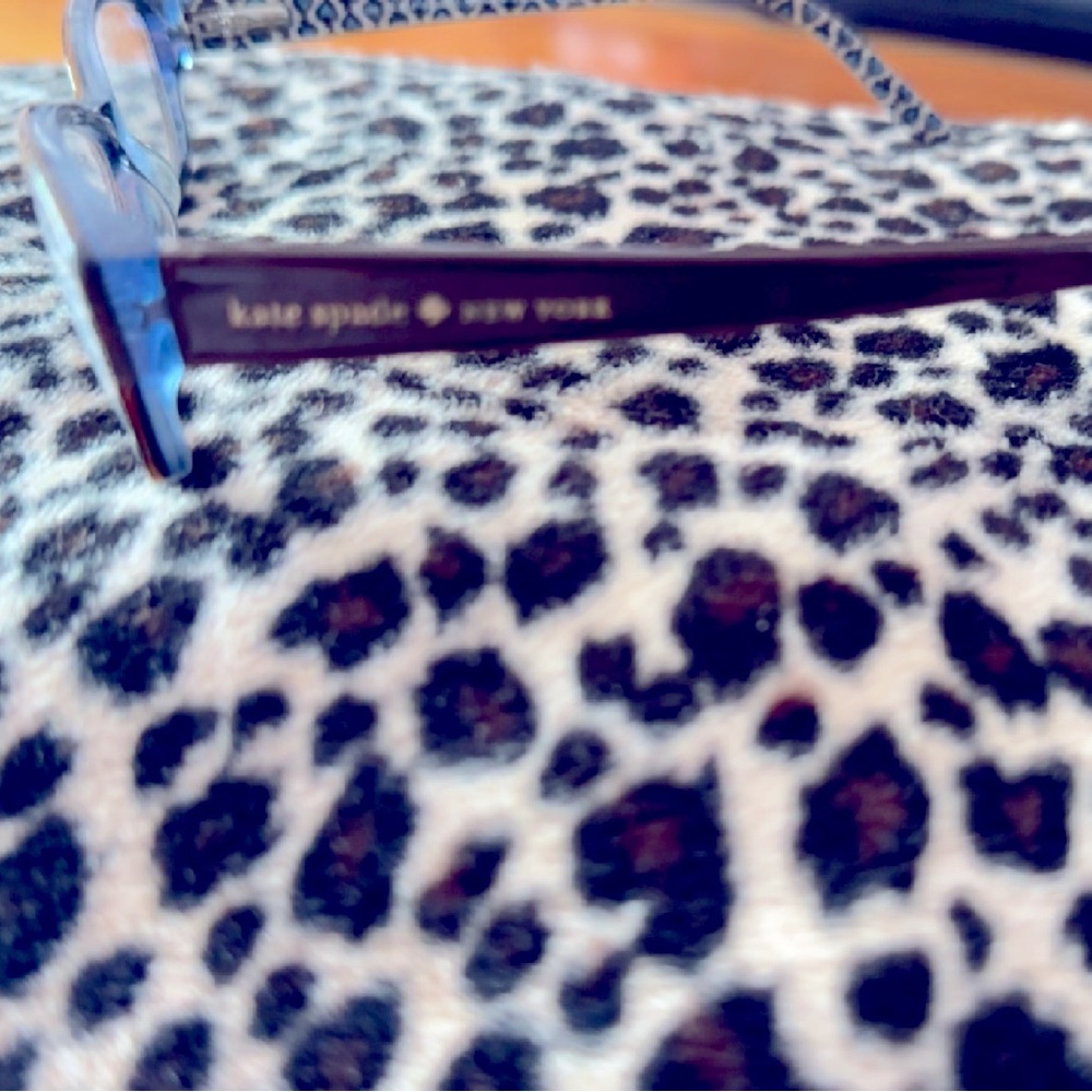 Used authentic Kate Spade eyeglasses brown and leopard print size small.